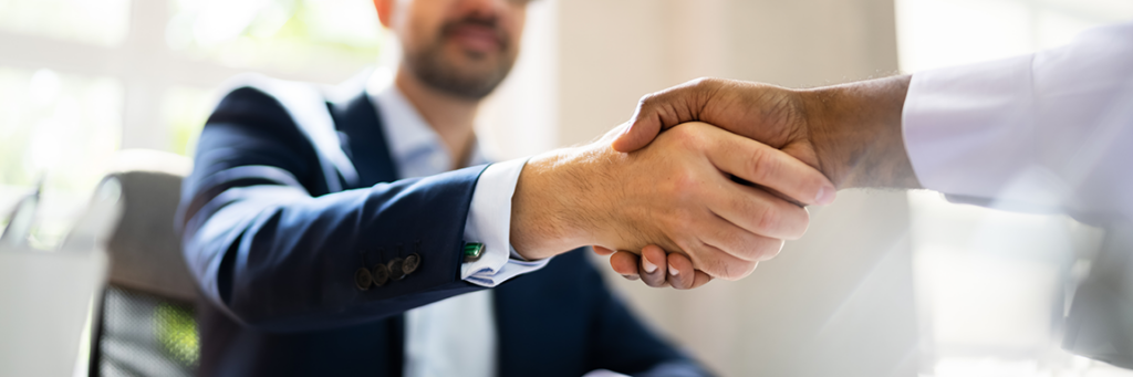 Regency Recruiting Employee Shaking Hands Image Header